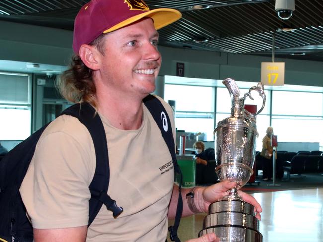 Australian golfer Cameron Smith pictured arriving home at the Brisbane Domestic Airport and bringing with him the Claret Jug from his win at The British Open. Picture David Clark