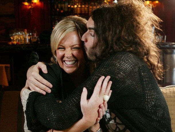 Undated : Channel Seven presenter Samantha Armytage gets a kiss from comedian Russell Brand : SUPPLIED MARCH 19, 2009