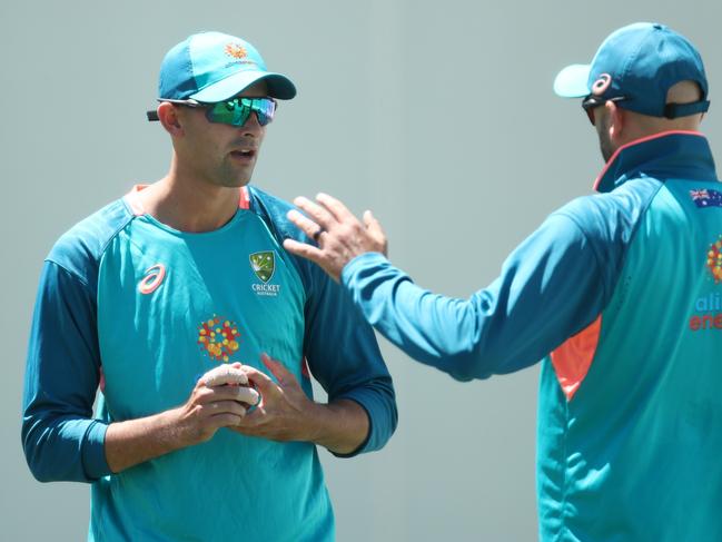 SYDNEY, AUSTRALIA - JANUARY 02: Ashton Agar of Australia talks to Nathan Lyon of Australia during an Australian Test squad training session at Sydney Cricket Ground on January 02, 2023 in Sydney, Australia. (Photo by Jason McCawley/Getty Images)
