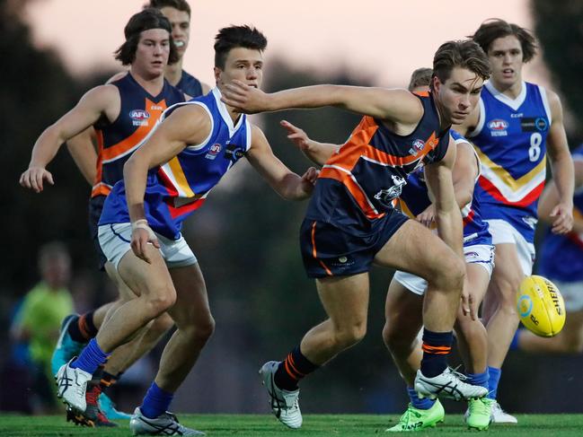 Rhylee West vies for possession against Eastern Ranges.