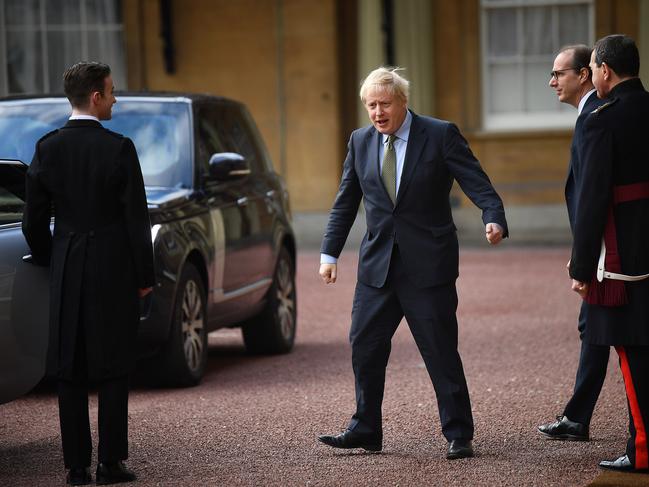 Prime Minister Boris Johnson leaves Buckingham Palace after meeting Queen Elizabeth II and accepting her invitation to form a new government. Picture: Getty