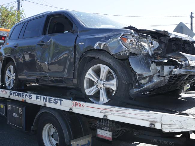 It took four men to lift the Toyota Kluger off an unconscious boy at Banksia Primary School in Greenacre. Picture: Hollie Adams/The Australian