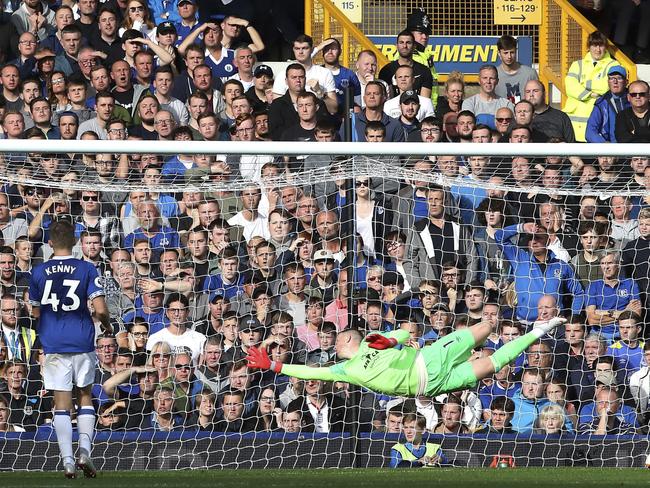 Everton goalie Jordan Pickford fails to stop a shot from West Ham United's Andriy Yarmolenko, not pictured, scoring his side's second goal of the game during their English Premier League soccer match at Goodison Park in Liverpool., England, Sunday Sept. 16, 2018. (Peter Byrne/PA via AP)