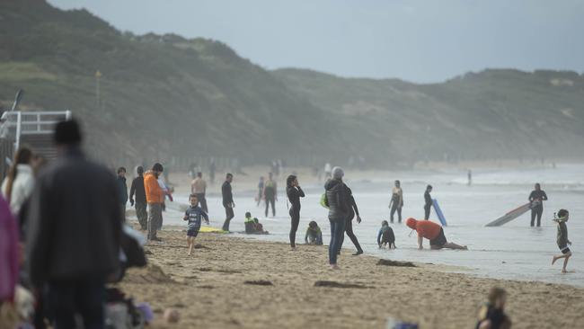 Crowds on the beach at Ocean Grove, near Geelong, on the Queen's Birthday weekend, while beaches on the far sunnier Gold Coast remained cut off to southern tourists. Picture: Alan Barber.