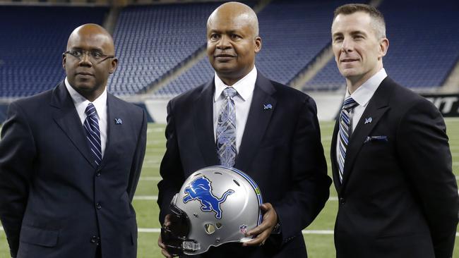 Detroit Lions head coach Jim Caldwell is flanked by general manager Martin Mayhew and president Tom Lewand.