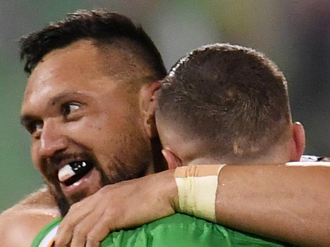 Jordan Rapana and Josh Hodgson of the Raiders celebrate their win over the Rabbitohs during the NRL Preliminary Final match between the Canberra Raiders and South Sydney Rabbitohs at GIO Stadium in Canberra, Friday, September 27, 2019. (AAP Image/Dean Lewins) NO ARCHIVING, EDITORIAL USE ONLY