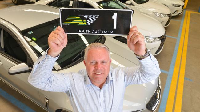 Pickles Auctions Regional Executive Gavin Dempsey with the number one South Australian Grand Prix number plate that sold for $593,000.. Pic: Brenton Edwards