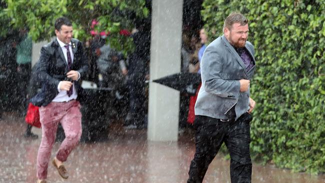 Melbourne Cup goers are urged to pack an umbrella. Picture: Alex Coppel