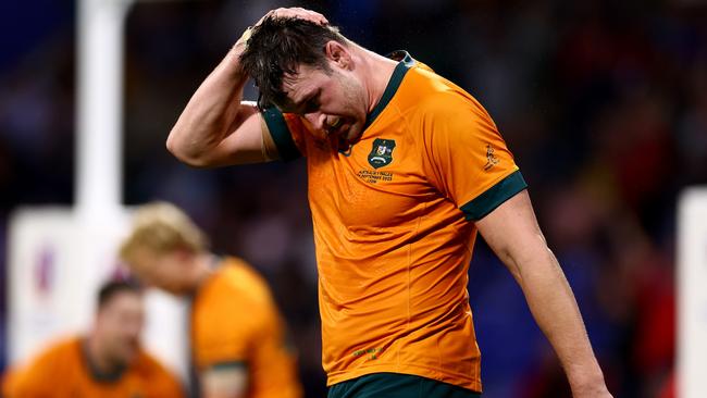 Nick Frost looks dejected at full-time following Australia’s loss to Wales in the Rugby World Cup. Picture: Getty Images