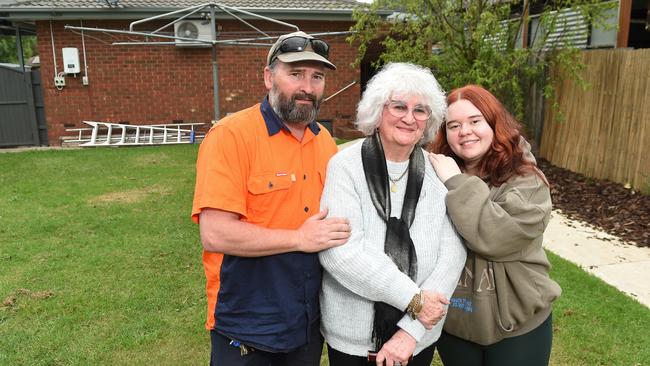 Scott Robinson, Rachael Robinson and Renee Robinson in the backyard where their new granny flat will go. Picture: Josie Hayden.