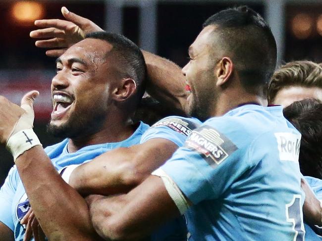 SYDNEY, AUSTRALIA - JULY 06: Sekope Kepu of the Waratahs celebrates with team mates after scoring a try during the round 18 Super Rugby match between the Waratahs and the Highlanders at Allianz Stadium on July 6, 2014 in Sydney, Australia. (Photo by Matt King/Getty Images)