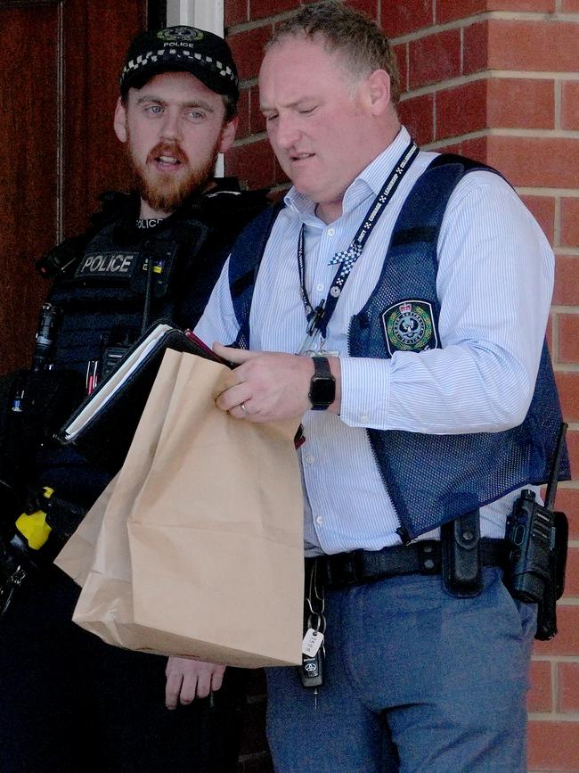 Police collecting evidence at the Gulfview Heights property. Picture: Dean Martin