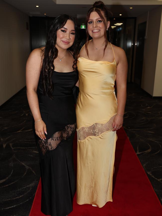 MELBOURNE, AUSTRALIA – JUNE 14 2024 Sienna Mosqueda and Charlotte Long attend the Lowanna College Senior Formal 2024 at the Moe Racing Club Picture: Brendan Beckett