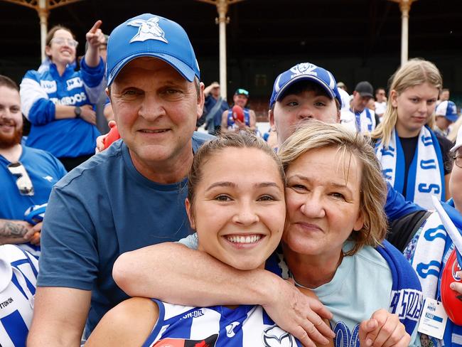 MELBOURNE, AUSTRALIA - NOVEMBER 26: Niamh Martin of the Kangaroos is seen with her parents during the 2023 AFLW Second Preliminary Final match between The North Melbourne Tasmanian Kangaroos and The Adelaide Crows at IKON Park on November 26, 2023 in Melbourne, Australia. (Photo by Michael Willson/AFL Photos via Getty Images)