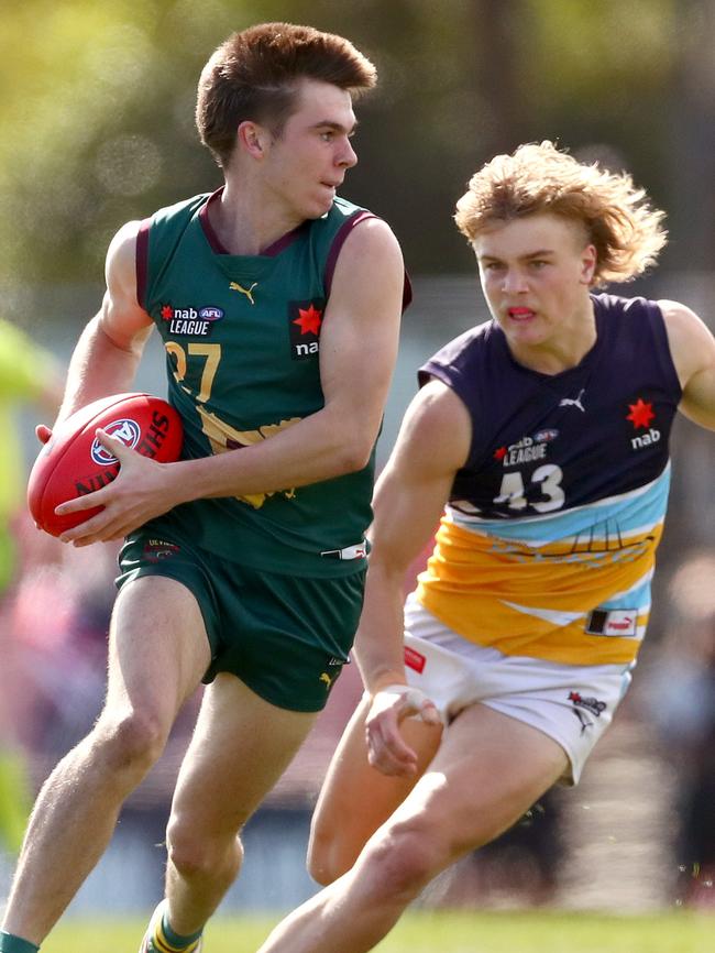 Oskar Smart tracks Colby McKercher during a Coates League game last year. Picture: Kelly Defina/AFL Photos/via Getty Images