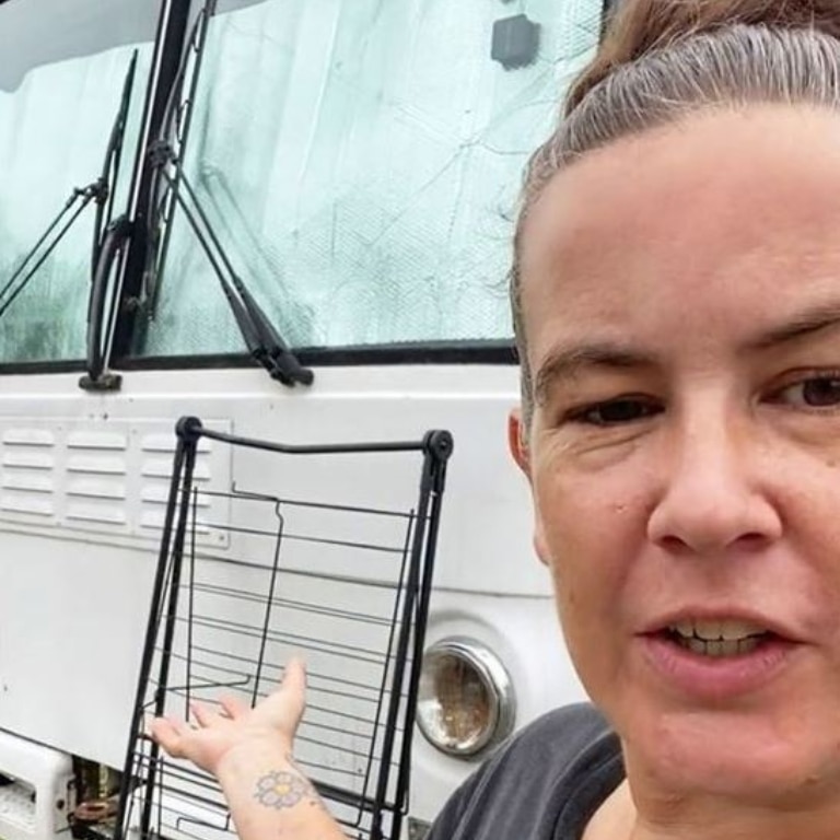 Emma shows off the bus she is forced to live in in regional Queensland. Picture: 9News