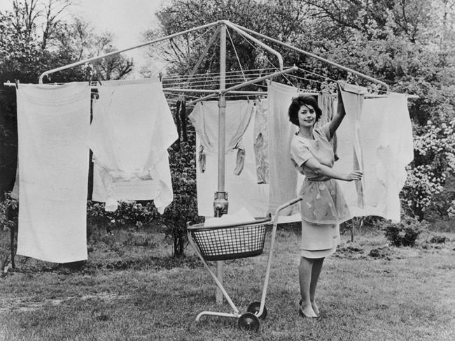 A housewife demonstrates the advantages of a Hills Hoist, 1968. Picture: National Archives of Australia