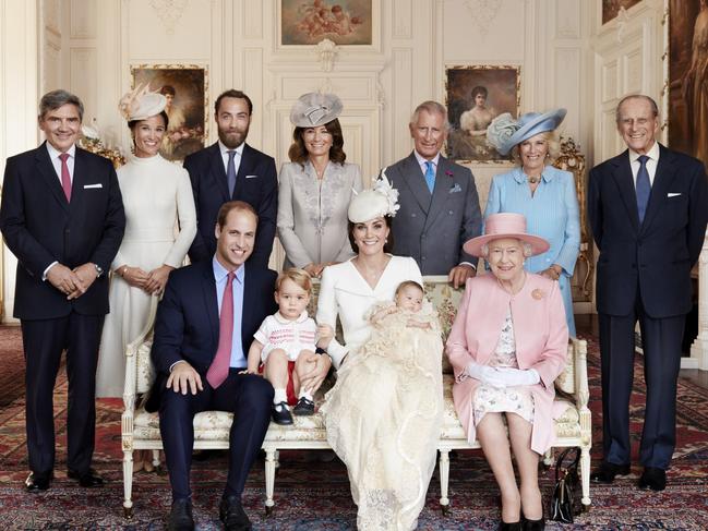 Britain’s Prince William, seated left, Kate Duchess of Cambridge with their children, Prince George, and Princess Charlotte, at Sandringham House England after the christening on Sunday July 5, 2015. They are pictured in the Drawing Room of Sandringham House with Queen Elizabeth II, from left, Michael Middleton, Pippa Middleton, James Middleton, Carole Middleton, Prince Charles, Camilla, Duchess of Cornwall and Prince Philip. Picture: Mario Testino/AP