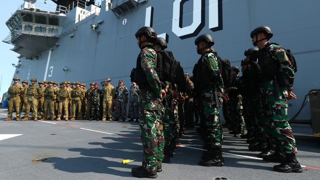 Australian Defence Force and Indonesian National Armed Forces members aboard the HMAS Adelaide ahead of Exercise Keris Woomera. Picture: Zizi Averill