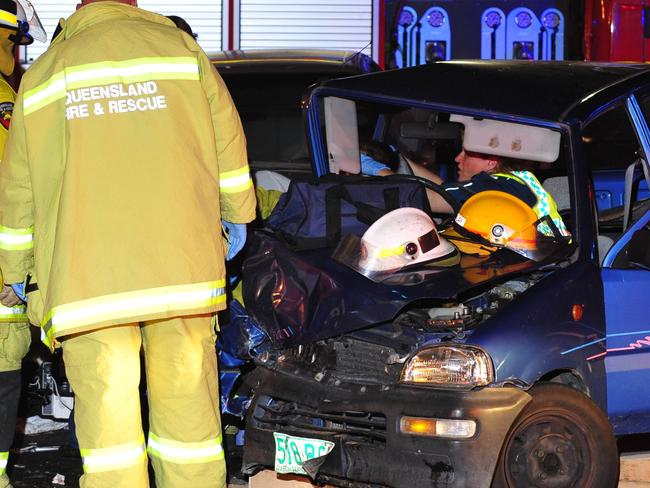 Crash scene at Mt Low Parkway. A woman had to be cut from her vehicle and two others were left with serious injuries after a head-on crash last night. The two-vehicle accident occurred about 6.45pm at the treacherous Mt Low Parkway and Bruce Highway intersection.