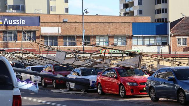 Scaffolding accident on Mann St in Gosford has seen eight cars and one ute crushed. Picture: Fiona Killman