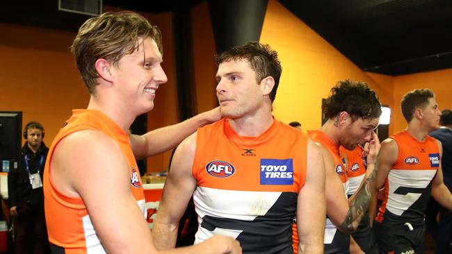 Heath Shaw, right, celebrated beating West Coast with teammate Lachie Whitfield. Picture: Getty Images