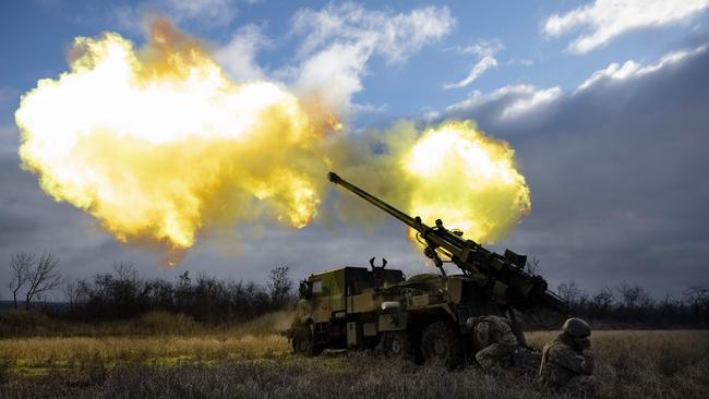 Ukrainian servicemen fire with a CAESAR self-propelled howitzer towards Russian positions in eastern Ukraine. Picture: AFP