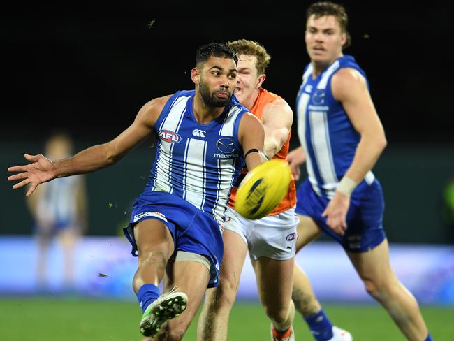 Tasmanian North Melbourne player Tarryn Thomas will be back in his home state again next season. Picture: Getty