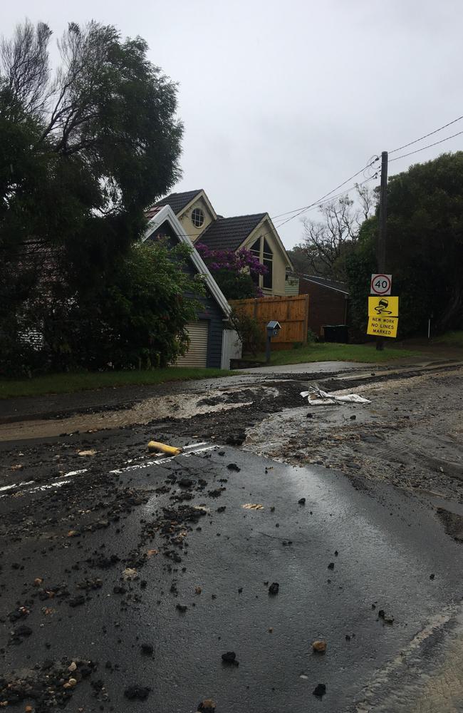 Road damage and debris in Plateau Rd, Avalon on Sunday, caused by a heavy downpour on a strip of the street undergoing roadworks. Picture: Supplied