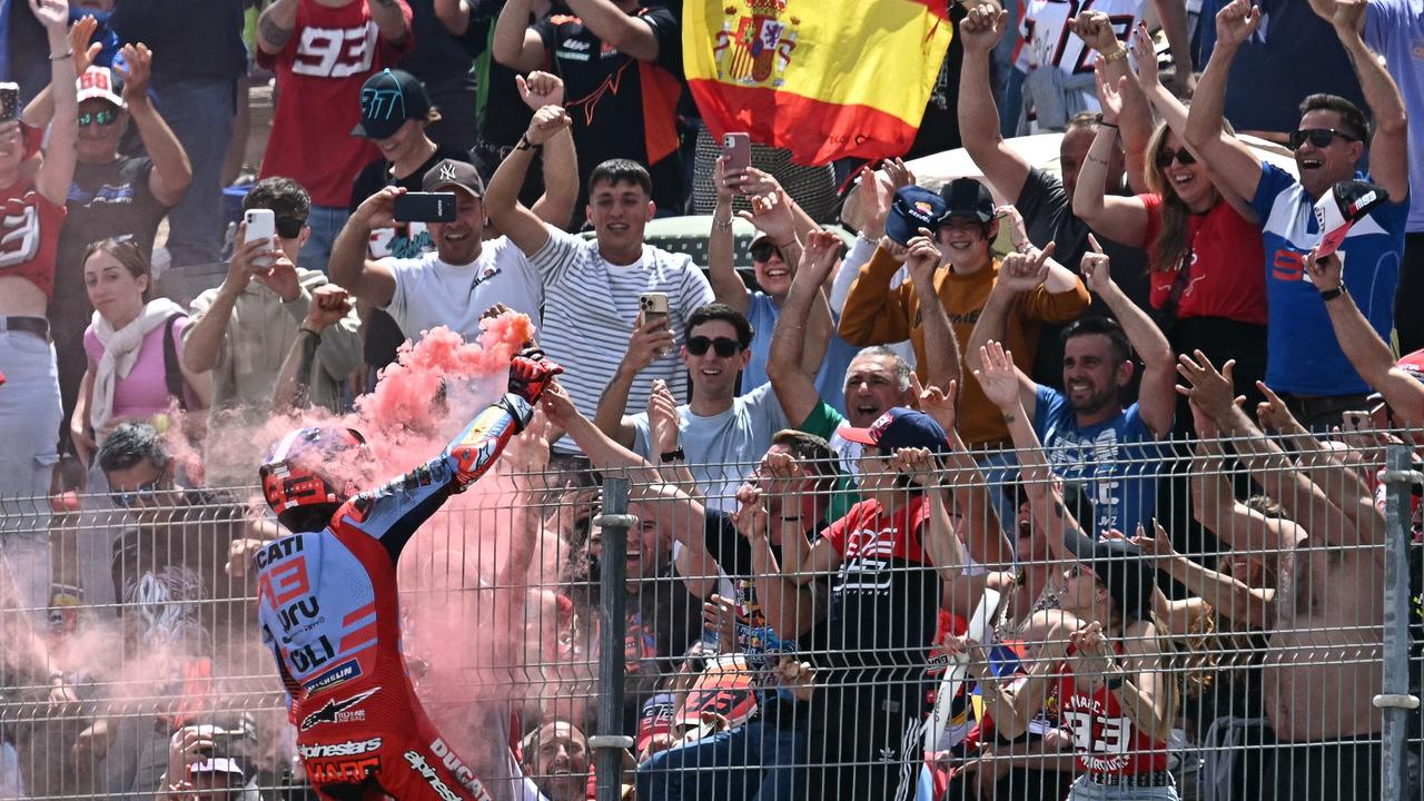 Marquez celebrated his first Ducati podium in Spain as much as any of his 59 wins in the MotoGP class. (Photo by JORGE GUERRERO/AFP)