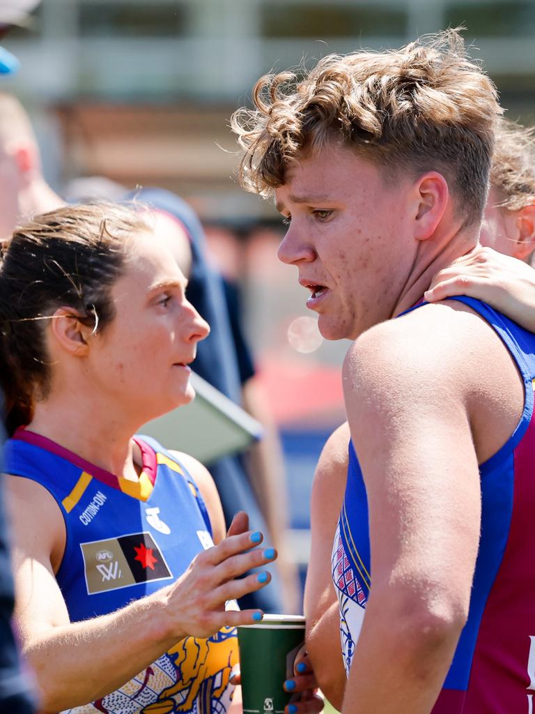 Dakota Davidson was consoled by teammates at three quarter time against St Kilda. Picture: Dylan Burns/AFL Photos via Getty Images.