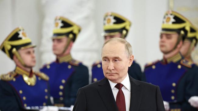 Vladimir Putin hosts a state awards ceremony at The Kremlin last June. Picture: pool/AFP