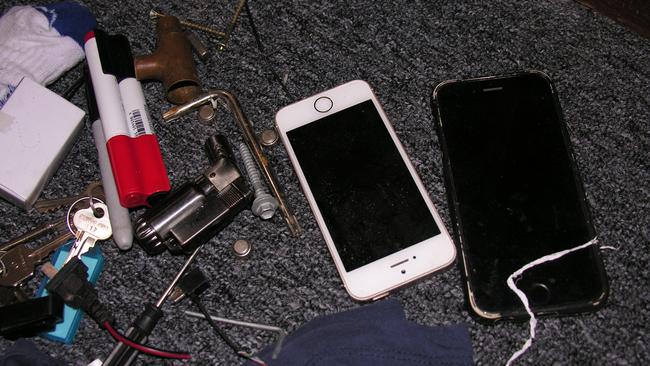 Items seized by investigators from the Australian Federal Police during a raid of a Gaven property in July.