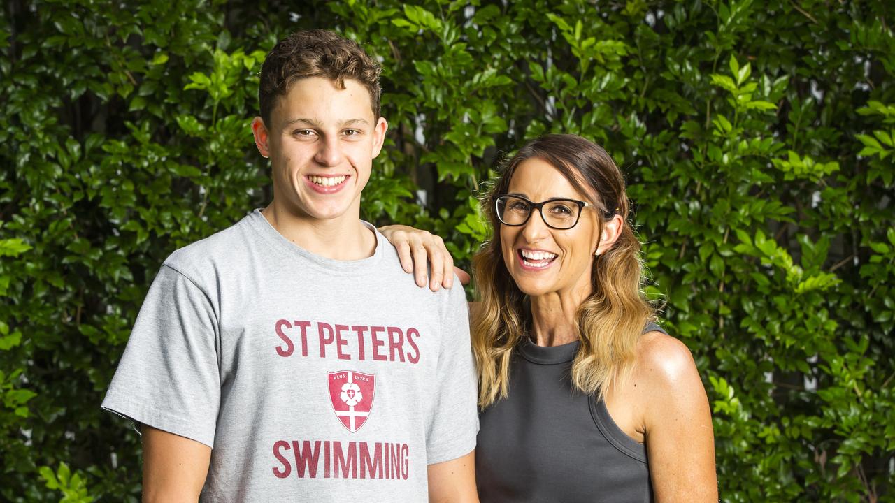 Taylor and mum, swimming great Hayley Lewis. Picture: Nigel Hallett