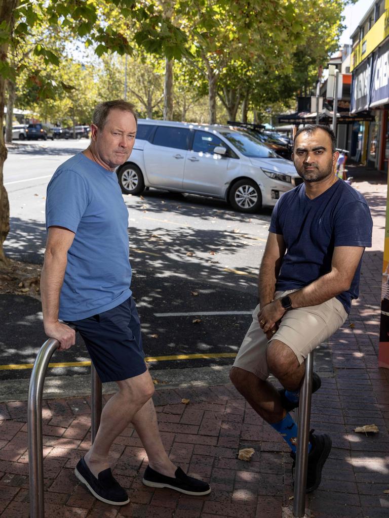 Hobo Menswear owner Ivan Deed and Coffylosophy owner Harsha Mehta are opposed to Adelaide City Council’s proposal to reduce car spaces on Hutt St. Picture: Kelly Barnes