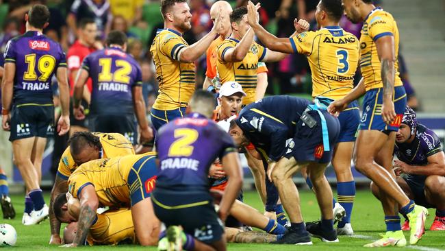 MELBOURNE, AUSTRALIA - MARCH 26:  The Eels celebrate victory after a try in golden point time during the round three NRL match between the Melbourne Storm and the Parramatta Eels at AAMI Park, on March 26, 2022, in Melbourne, Australia. (Photo by Kelly Defina/Getty Images)