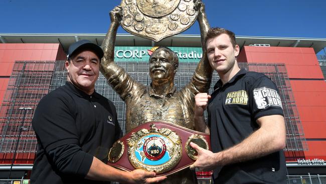 Jeff Fenech and Jeff Horn at the Wally Lewis statue outside Suncorp Stadium. Picture: Darren England.