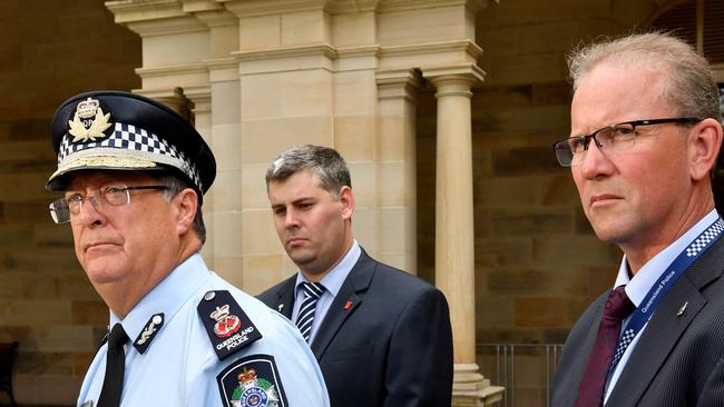 Police Commissioner Ian Stewart, Police Minister Mark Ryan (centre) and Queensland Police Union President Ian Leavers (right) at Parliament House this week. (AAP Image/Darren England)