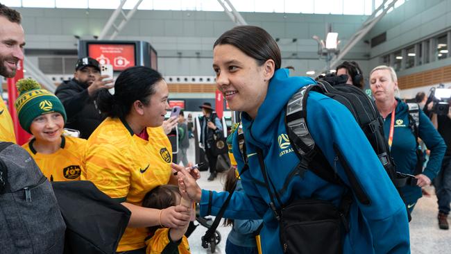 Sam Kerr greets fans at Sydney Airport on Sunday. Picture: AAP Image