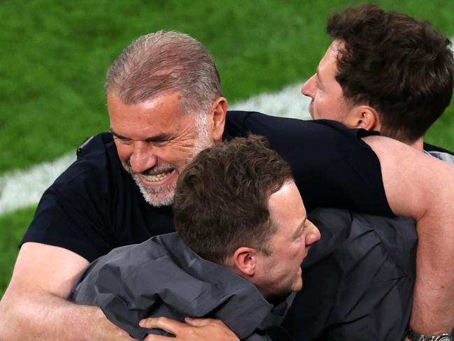 BILBAO, SPAIN - MAY 21: Ange Postecoglou, Manager of Tottenham Hotspur, celebrates his teams first goal scored by Brennan Johnson (not pictured) with his coaching staff during the UEFA Europa League Final 2025 between Tottenham Hotspur and Manchester United at Estadio de San Mames on May 21, 2025 in Bilbao, Spain. (Photo by Carl Recine/Getty Images)