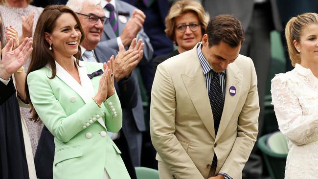 The pair enjoyed a giggle. (Photo by Clive Brunskill/Getty Images)