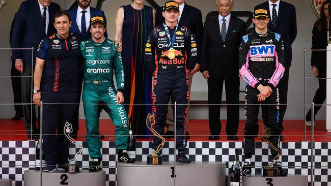 Red Bull Racing's Dutch driver Max Verstappen (centre), second-placed Aston Martin driver Fernando Alonso (2nd left) and third-placed Alpine driver Esteban Ocon (right). Photo by Jeff PACHOUD / AFP