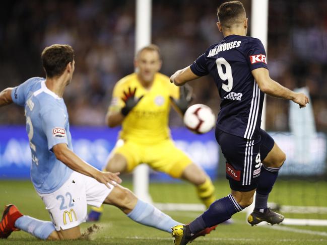 Kosta Barbarouses of the Victory (right) kicks a goal during the Round 20 A-League match between Melbourne Victory and Melbourne City at Marvel Stadium in Melbourne, Saturday, February 23, 2019. (AAP Image/Daniel Pockett) NO ARCHIVING, EDITORIAL USE ONLY
