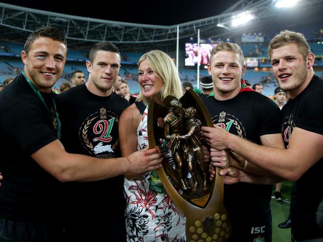 Julie Burgess with her sons Sam, Luke ,George and Tom with the trophy during the lap of honour in the 2014 NRL Grand Final. Picture: Gregg Porteous