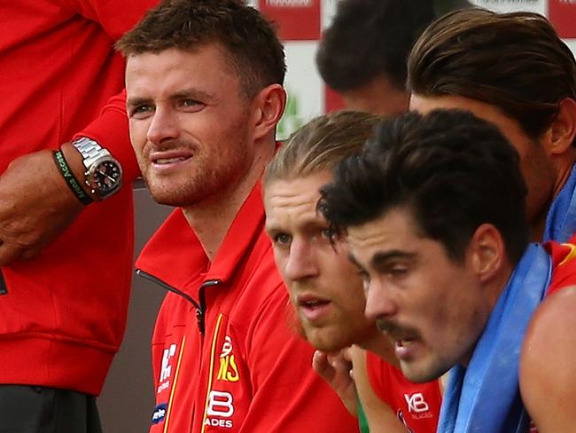 PERTH, AUSTRALIA - APRIL 07: Pearce Hanley of the Suns looks on from the bench during the round three AFL match between the Gold Coast Suns and the Fremantle Dockers at Optus Stadium on April 7, 2018 in Perth, Australia.  (Photo by Paul Kane/Getty Images)