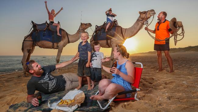 Sunset camel rides are a great evening activity in Lakes Entrance. Picture: Alex Coppel.