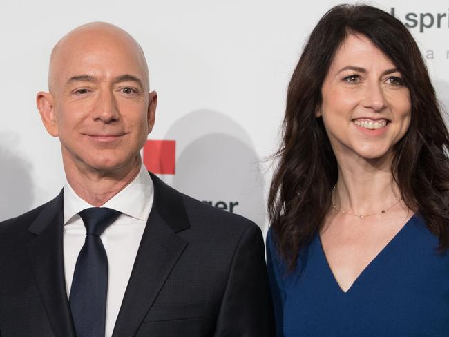 Amazon CEO Jeff Bezos and his wife MacKenzie Bezos. Picture: AFP/ Jorg Carstensen