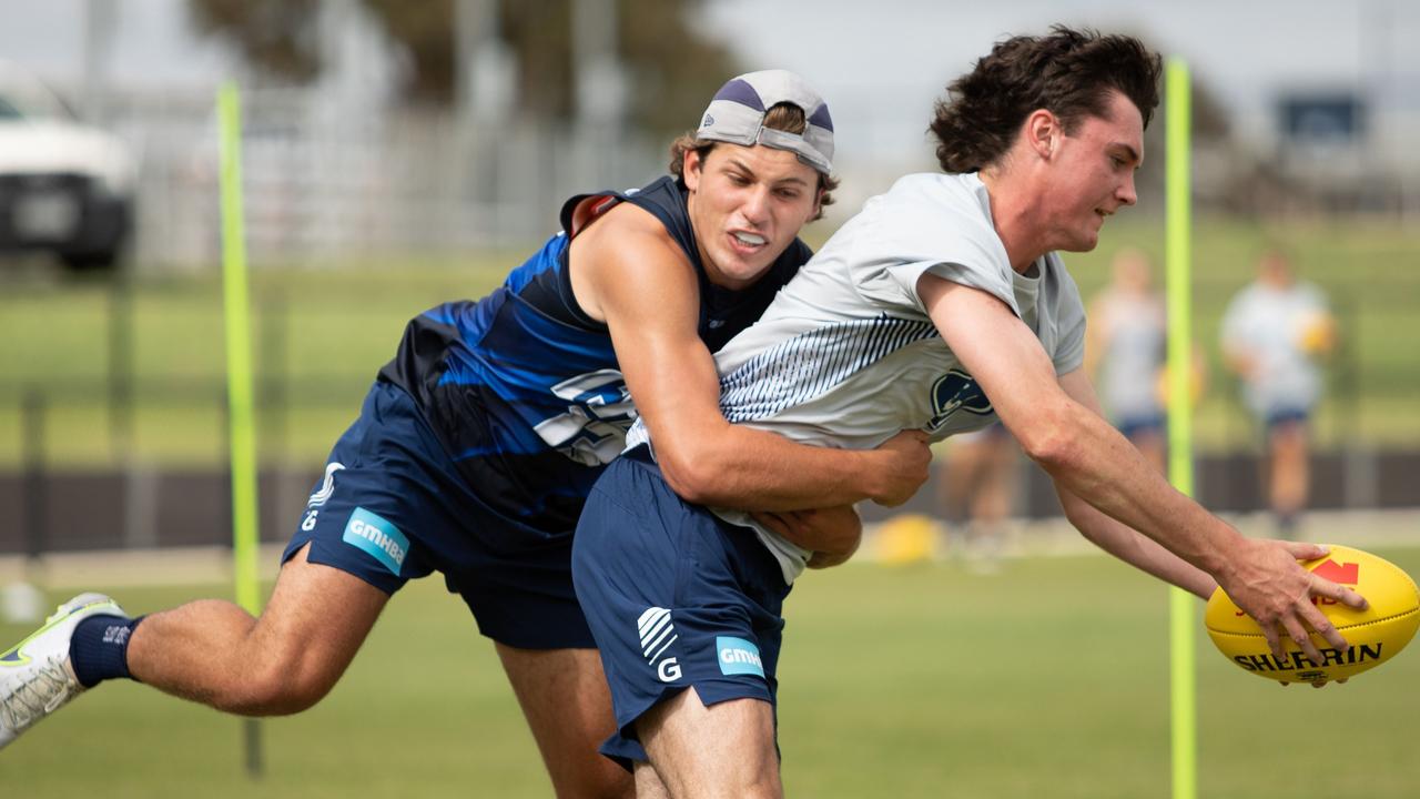 Jhye Clark, left, is one to watch if he gets an early game. Picture: Riley Lockett/AFL Victoria