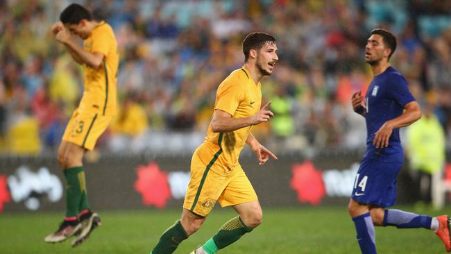 Mathew Leckie of Australia celebrates scoring a goal.