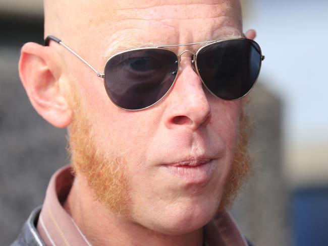 Astro Labe arrives for sentencing at the Hobart Magistrates Court, in Hobart, Monday, April 9, 2018. Labe pleaded guilty to one count of causing harm to a Commonwealth public official after he attacked former Prime Minister Tony Abbott as he walked along the Hobart waterfront on September 21, 2017. (AAP Image/Rob Blakers) NO ARCHIVING